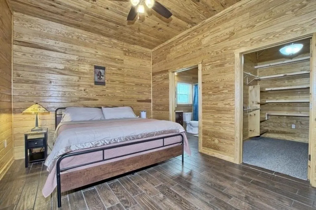 Primary Bedroom has a king bed, full bath, and a HUGE closet.