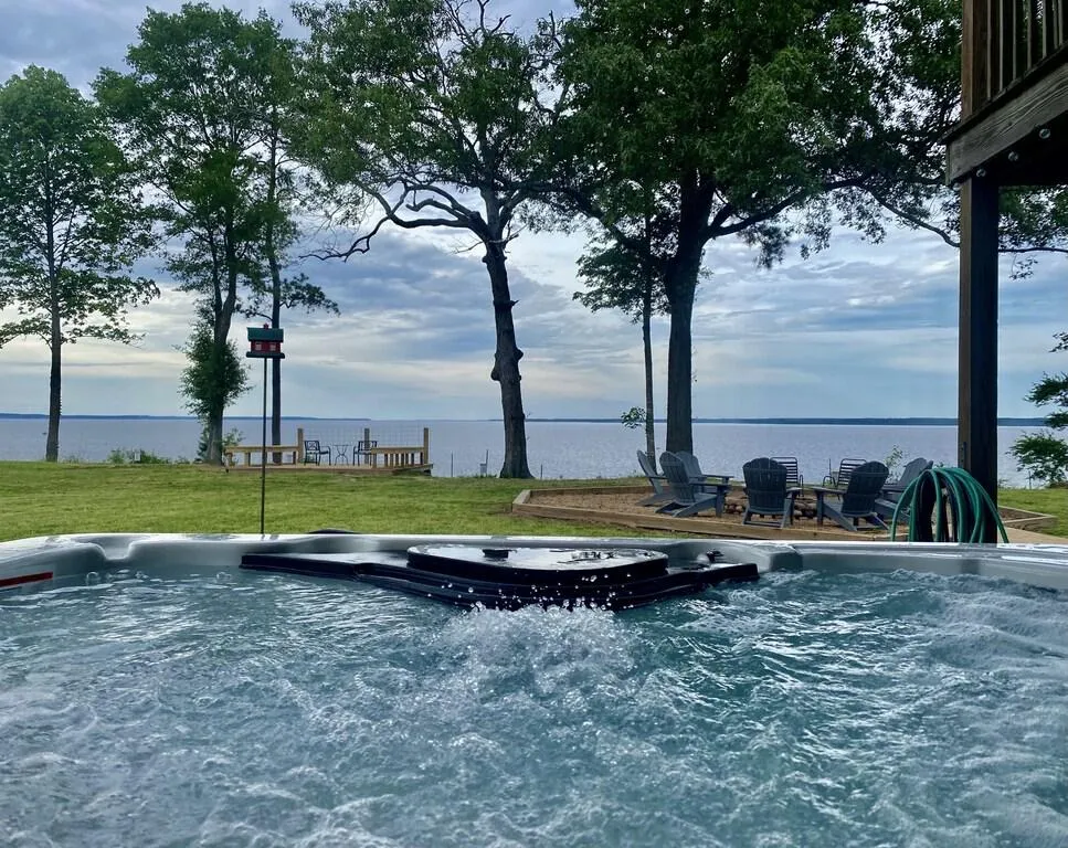 Relax in our 5 person hot tub with an amazing view of the Lake.