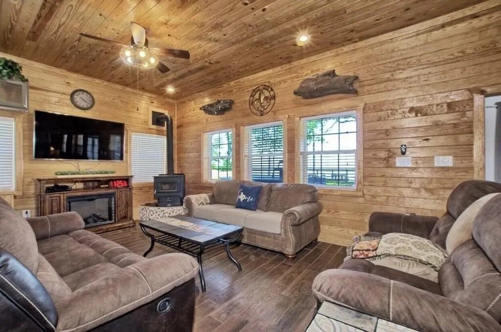 Comfy living room with electric fireplace and 
65" smart TV